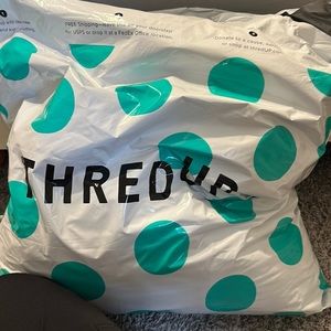 Mystery bag: free people Versace dooney and bourke, Nike, 8 pairs of jeans